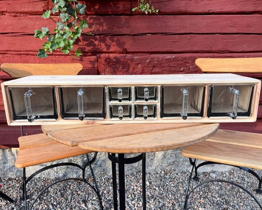 Ormesta Hylla med skäppor små och stora